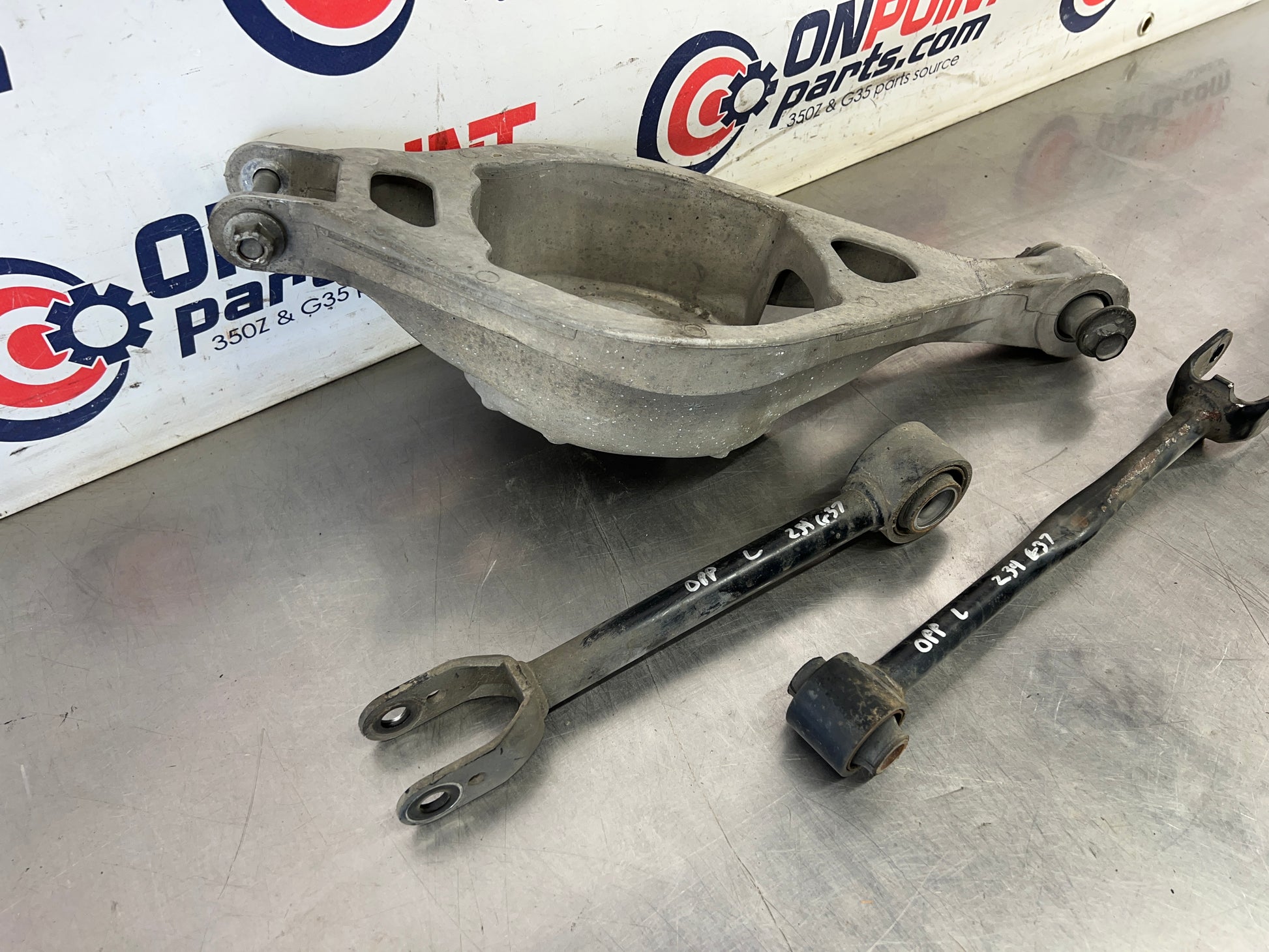 2008 Infiniti G37 Driver Left Rear Lower Control Arms and Spring Bucket OEM 21BAXDG - On Point Parts Inc