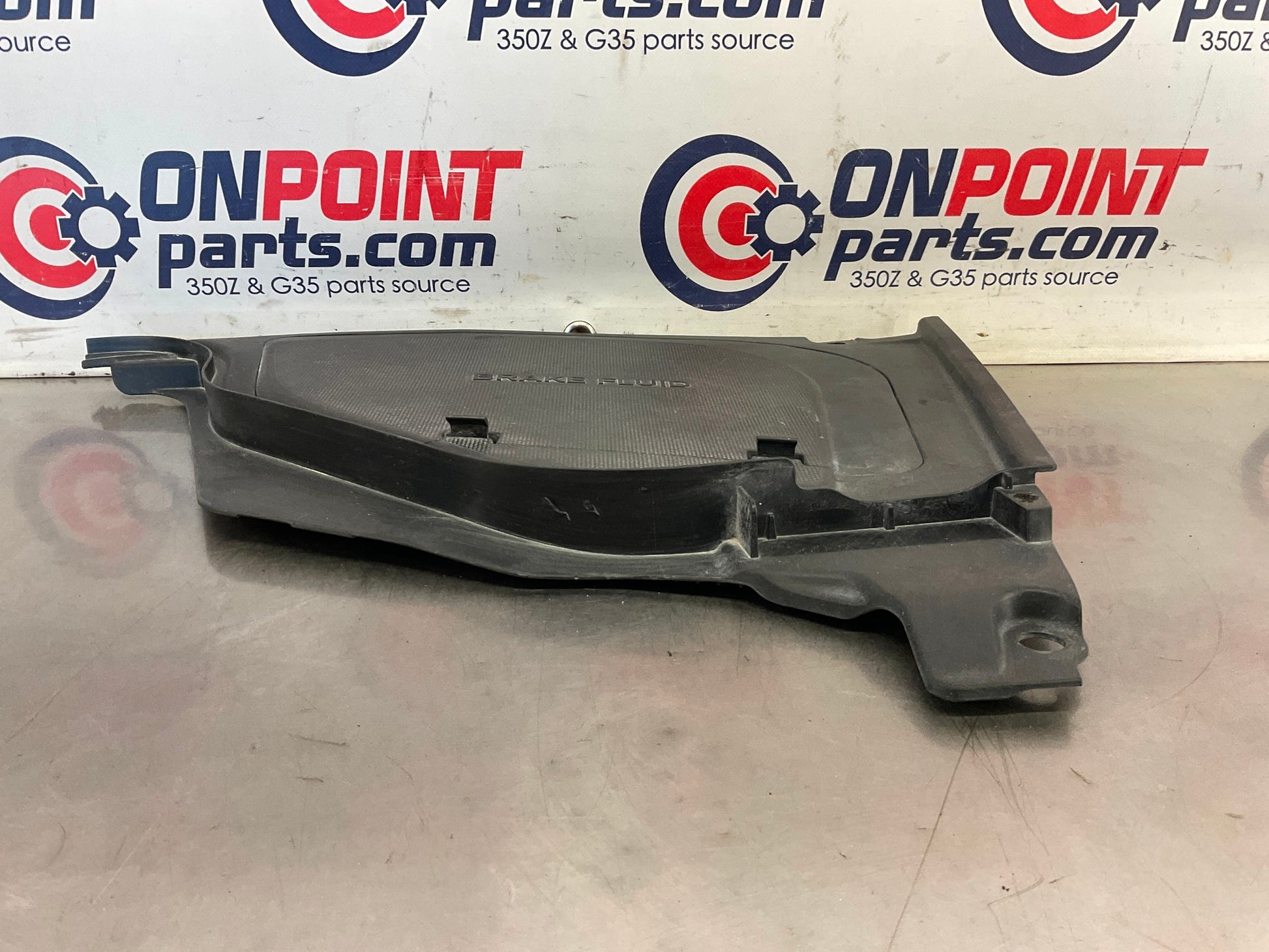 2012 Nissan 370Z Brake Fluid Bezel Trim Cover 64895 OEM 24BDME3 - On Point Parts Inc