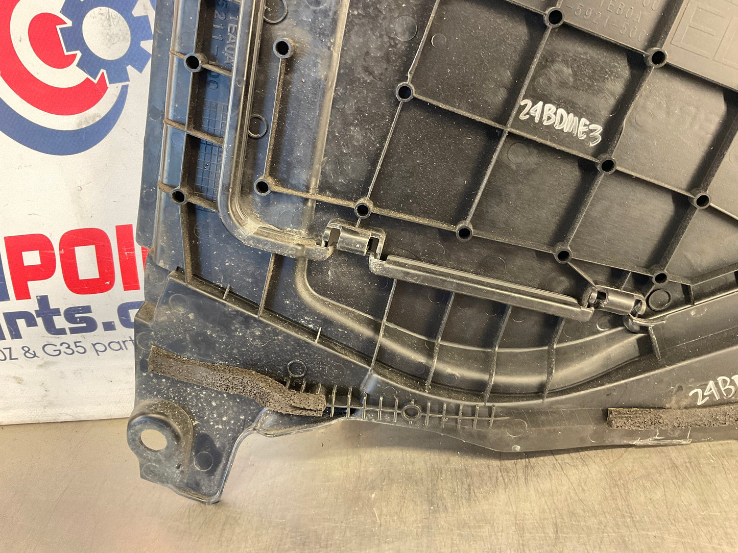2012 Nissan 370Z Brake Fluid Bezel Trim Cover 64895 OEM 24BDME3 - On Point Parts Inc