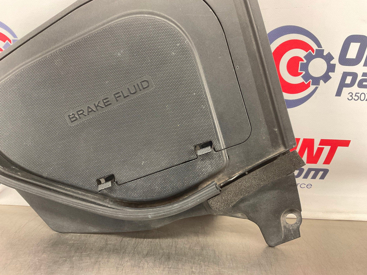 2009 Nissan 370Z Brake Fluid Cover Bezel Trim OEM 64895 65278 15BKJD2 - On Point Parts Inc