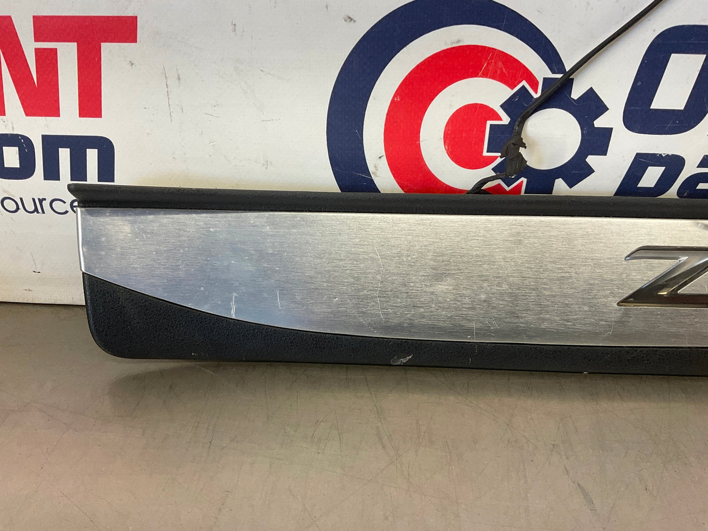 2012 Nissan 370Z Passenger Illuminated Door Threshold Kick Plate OEM 24BDME7 - On Point Parts Inc