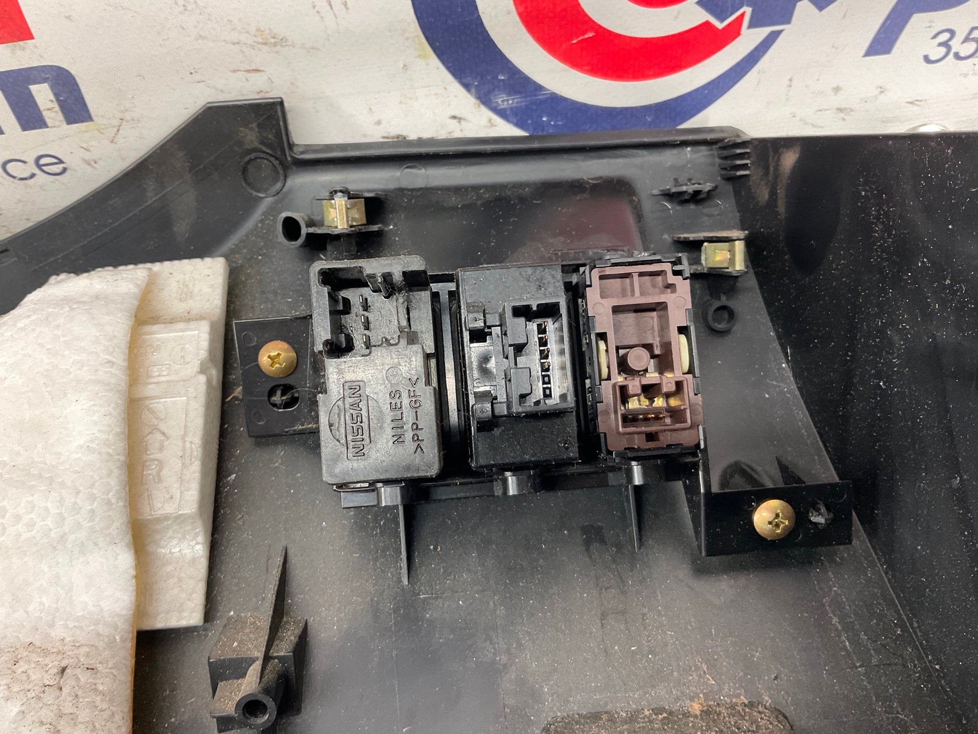 2005 Infiniti G35 Driver Left Lower Dash Panel with Switches OEM 24BFFE7 - On Point Parts Inc